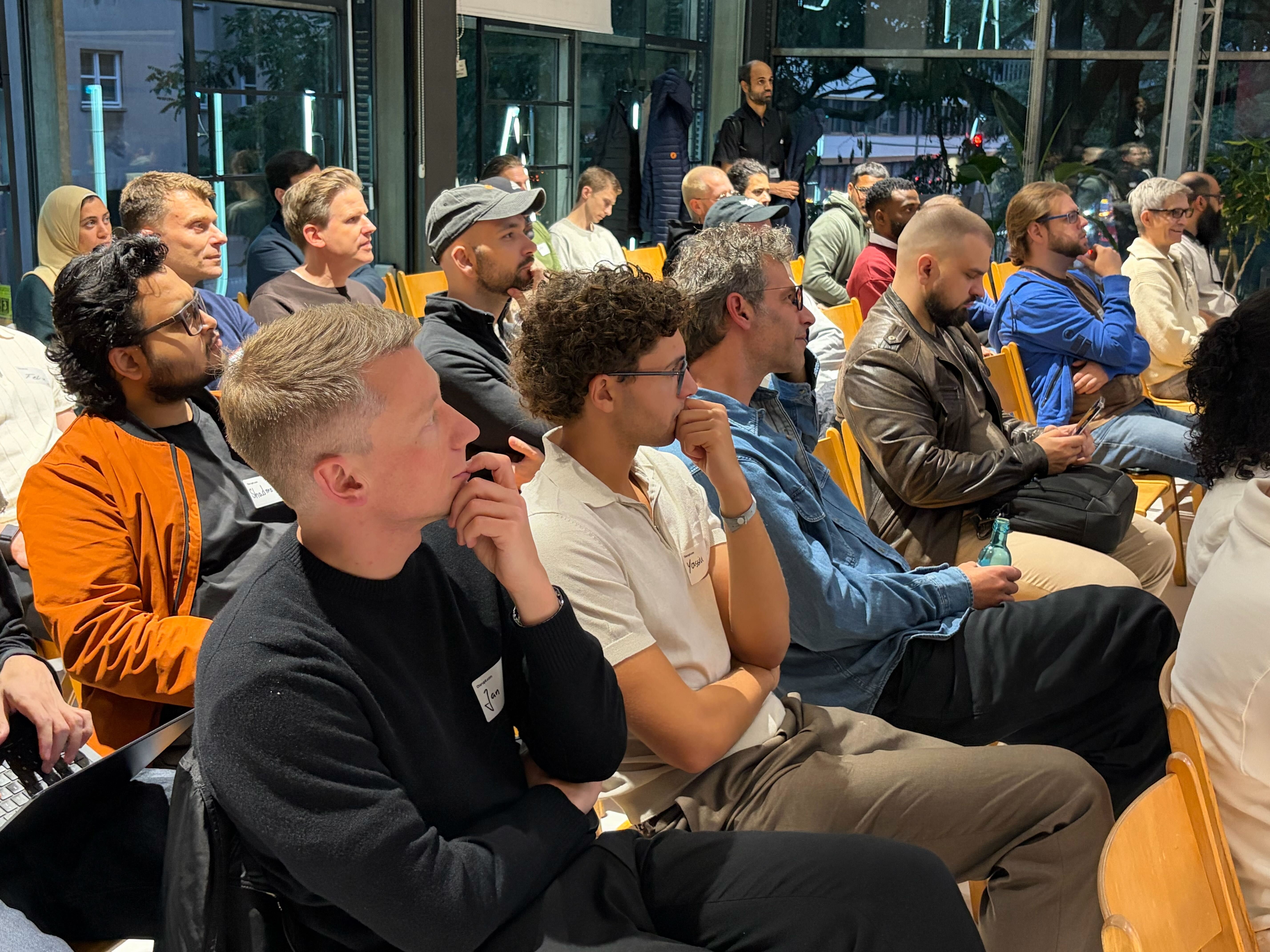 Founders and operators talk in small groups after a Builder’s Meetup session.